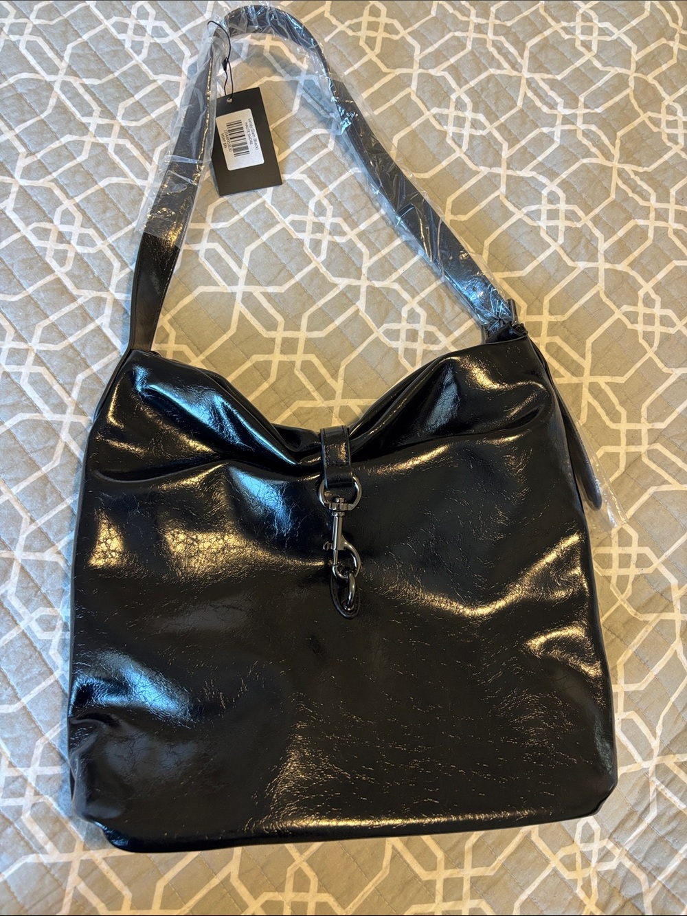 HAUTE SHORE Sandy Glam Black Patent Shoulder Bag with Hook Closure
